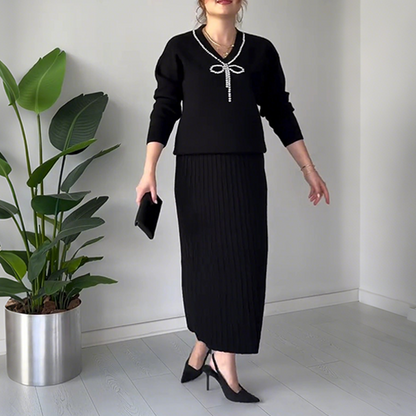 Elegantes zweiteiliges Set aus Pullover und Rock mit Strassschleife für Damen